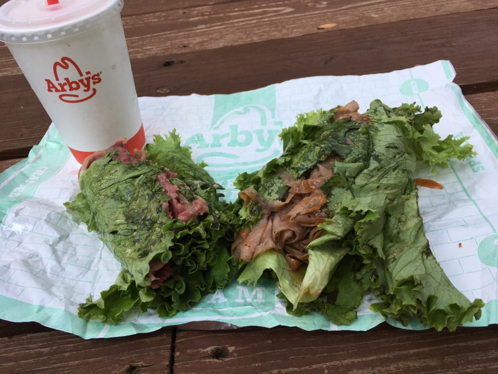 Two low carb and keto friendly lettuce wrapped sandwiches from Arby's.